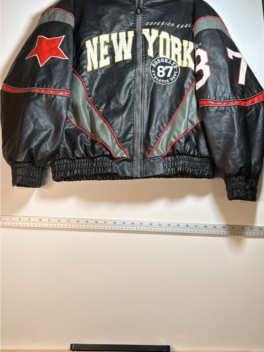 Fashion Nova Black Leather Bomber Jacket with Yellow Accents